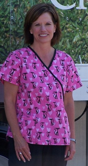 Patient smiling after receiving dental care through community outreach program